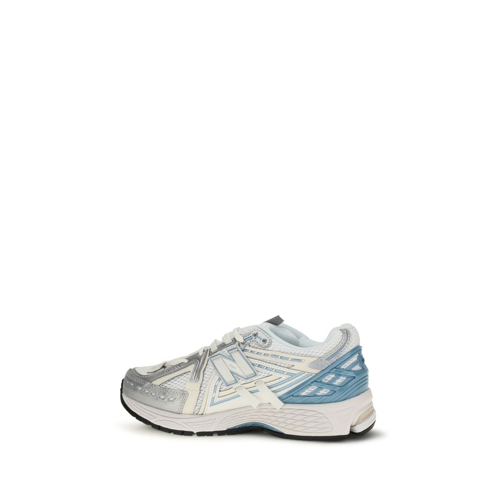Sneakers sportive New Balance in tessuto bianco