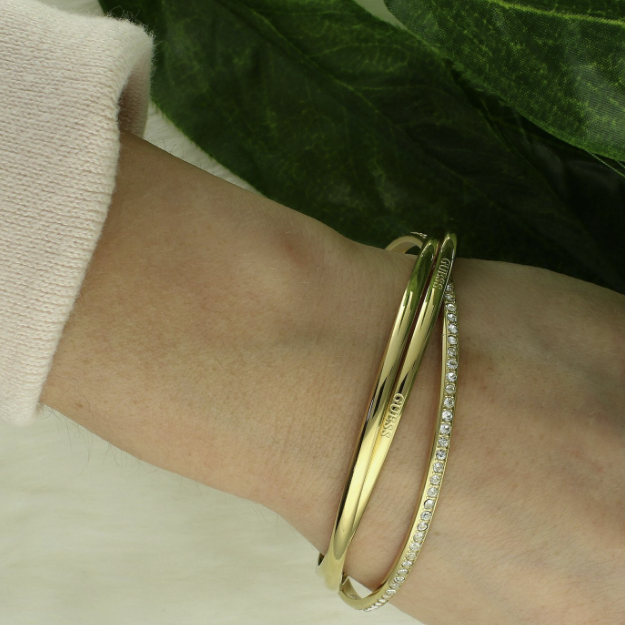Bracciale Rigido Guess in Acciaio PVD Oro con Zirconi Bianchi