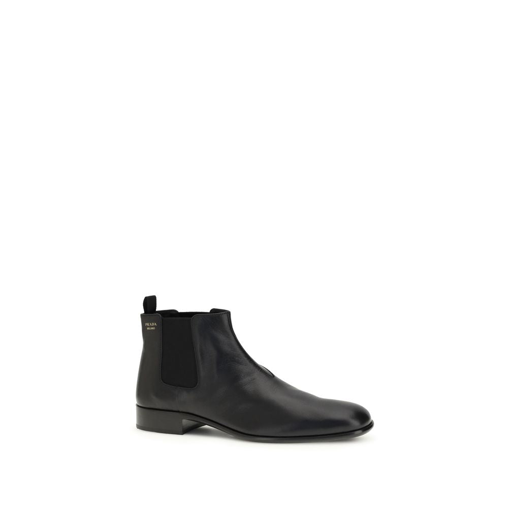 Prada Stivaletti Chelsea Neri in Pelle di Capra Logo Smaltato SS26