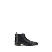 Prada Stivaletti Chelsea Neri in Pelle di Capra Logo Smaltato SS26