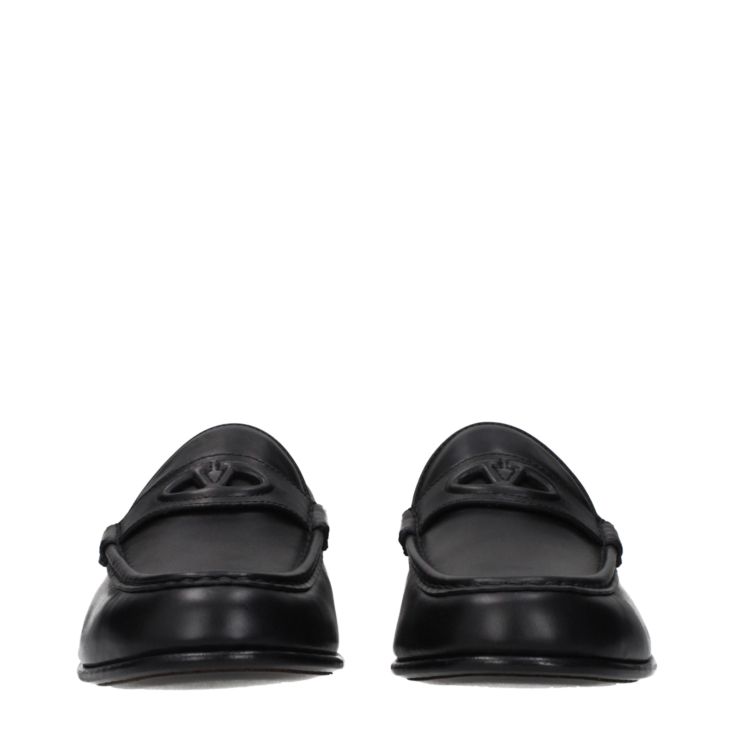 Valentino Garavani Black Leather Slip-On Loafers (Front Logo)